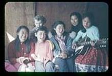 Group of girls [middle girl is Jean Kupok] singing, Richards Island, N.W.T. [July, 1956]