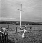 [Chief Isapo-muxika's (Chief Crowfoot) grave marker, Siksika First Nation, Alberta]. [between 1956-1960]