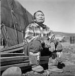 [Inuksiak sitting, Iqaluit, Nunavut]. [between 1956-1960]