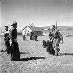 [Children participating in a sack race, Niaqunngut, Iqaluit, Nunavut]. 1960