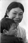 [Kenojuak Ashevak with her son Adlareak, Kinngait, Nunavut]. 1960