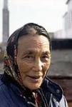 Elderly Inuit woman wearing head scarf, Arviat [Elizabeth Nutaraluk]  1979.