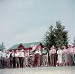 Male contestant tees off in the invitation golf tournament featured on the opening day of Fundy National Park. July 1950
