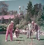 A game of croquet at Braemar Lodge, on Lake Ellenwood, Nova Scotia  1952