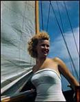 Betty Jackson, 16, aboard sailboat at Sarnia, Ontario Yacht Club.  1949.