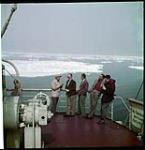 Members of government party aboard the E.A.P. vessel "C.D. Howe".  juillet 1951.