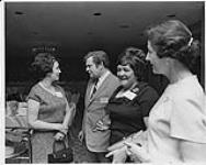 Men and women socializing at a nursing conference, Ottawa  1970
