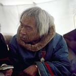 Kingwatsiak in a tent, Cape Dorset, Nunavut  [between June-September, 1960].