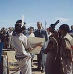 Queen Elizabeth and Prince Philip presented with artwork from the First Nation women of Nanaimo, B.C.   juillet 1959