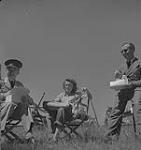 Captain of the clouds, group eating lunch. North Bay, Ontario. August, 1941