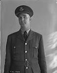 Formal portrait of Pilot Officer A.E. Henderson. September 30, 1940