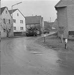 Exercise Reforger IV.  A Centurian tank and APC of the R.C.D.'s going threw a small German village.  Lahr. 20-24 January 1973.