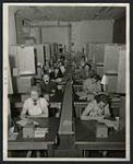 Catalogue telephone operators at work. [ca. 1955]
