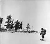 Dr. Rivard snowshoeing. 1954