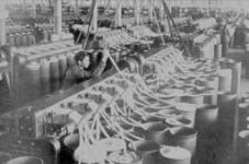 [Man working in factory]. [ca. 1900]