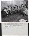 Above the boys enjoys a chat with camp councillors. 1964