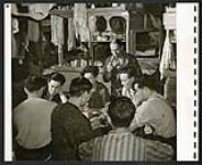 Bunkhouses for the more distant lumber camps. Men visit their families on week-ends. [1943/11-1943/12]