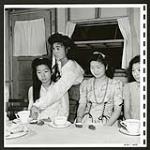 Japanese evacuee students enjoy their school graduation banquet. [1945/06/16-1945/06/28]