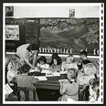 White and Japanese boys and girls sit side by side in these Picture Butte classrooms. [2/2]. [1945/06/16-1945/06/28]