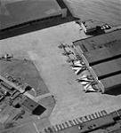 Aerial views  of CF-105's (5) outside hangar. 8 May 1959