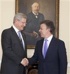 [Prime Minister Stephen Harper is greeted by Juan Manuel Santos Calderón, President of Colombia, at the Casa de Narino in Bogotá, Colombia] 10 August 2011
