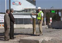 [Prime Minister Stephen Harper and Justice Minister and Attorney General Rob Nicholson talk with senior project manager Chris Hawkins at the construction site of the Queenston Plaza border crossing in Niagara-on-the-Lake, Ontario] 3 September 2009