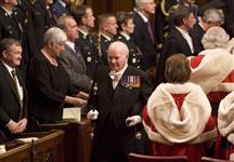 [The Usher of the Black Rod escorts Prime Minister Stephen Harper and the Governor General Michaëlle Jean out of the Senate Chamber following the Speech from the Throne on Parliament Hill in Ottawa] 16 October 2007