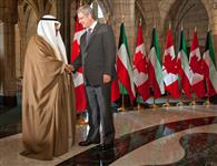 [Prime Minister Stephen Harper greets Sheikh Nasser Al-Mohammed Al-Ahmed Al-Jaber Al-Sabah, Prime Minister of Kuwait, on his arrival on Parliament Hill] 26 September 2011
