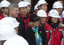 [Prime Minister Stephen Harper and his wife Laureen Harper tour the Expo Canada Pavilion with Expo 2010 Commissioner General's Mr. Mark Rowswell and Mr. Hua Guo in Shanghai, China] 4 December 2009