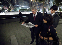 [Prime Minister Stephen Harper visits the 9/11 memorial with Anna, Matthew and Jonathan Egan in New York City] 20 September 2011
