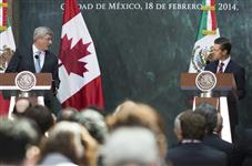 [Prime Minister Stephen Harper participates in a joint media statement with Enrique Peña Nieto, President of Mexico, at the Palacio Nacional in Mexico City] 18 February 2014
