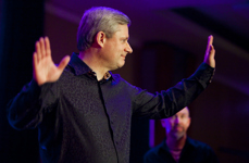 [Prime Minister Stephen Harper is the frontman in Ottawa-area band Herringbone during the Conservative Christmas Party at the Crown Plaza Hotel in Ottawa] 8 December 2010