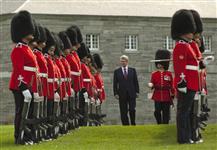 [Prime Minister Stephen Harper inspects the honour guard at Fort Lennox in Saint-Paul-de-l'Île-aux-Noix, Quebec, prior to announcing new battle honours commemorating the War of 1812] 14 September 2012