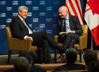 [Prime Minister Stephen Harper participates in a moderated discussion in the Goldman Sachs Auditorium with Gerard Baker, Editor-in-Chief of the Wall Street Journal, during his visit to New York City for the United Nations General Assembly] 24 September 2014