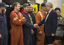 [Prime Minister Stephen Harper, joined by the Honourable Kerry-Lynne Findlay, tours the British Columbia Institute of Technology Annacis Campus with Steve Perry and Gary Shore, in Delta, British Columbia] 8 January 2015