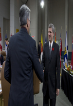 [Prime Minister Stephen Harper shakes hands with Northwest Territories Premier Floyd Roland at the start of the First Ministers' Meeting in Ottawa] 10 November 2008