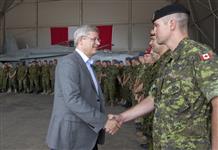 [Prime Minister Stephen Harper meets with some of the troops following his addresses at the Trapani-Birgi Air Force Base in Trapani, Italy] 1 September 2011