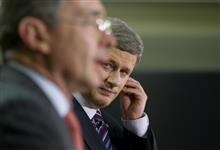 [Prime Minister Stephen Harper holds a joint news conference with Colombian President Álvaro Uribe Velez after the signing of a free trade agreement between Canada and Colombia while in Lima, Peru] 21 November 2008