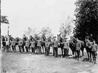 Officers and horses (2nd Cdn. Field Ambulance). June, 1916 June, 1916