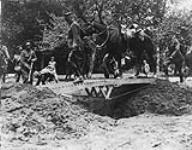 Bridging a trench (Fort Garry Horse). June, 1916 June, 1916