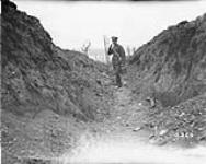 German communication trench after British bombardment. July, 1916 July, 1916