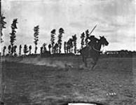 (Sports - Corps Cavalry Regiment.) Tent Pegging. Capt. Cameron. August, 1916 Aug., 1916.