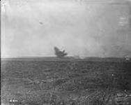 A heavy shell bursts near the camera September, 1916.