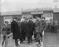 (Prime Minister Sir Robert Borden visits the Western Front) Hon. J.D. Hazen, Sir Robert Borden and Hon. Bob Rogers at New Brunswick Hut, Canadian Base Hospital. March, 1917 March, 1917.