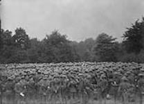 Army Chaplain addressing Canadian troops on occasion of 50th anniversary of Dominion Day. July 1st, 1917. France July 1, 1917.