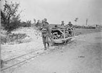 Canadians wounded at Lens on way to Blighty via Light Railway September 1917.