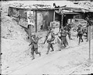 78th Bn. men leaving Y.M.C.A. Dugout near front line. September, 1917 Sept., 1917