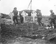 Wounded Canadian being taken to an aid-post. Battle of Passchendaele, November 1917 Nov. 1917