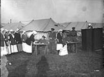 Canadian Sisters at a Canadian Hospital in France voting. December, 1917 Décembre, 1917.