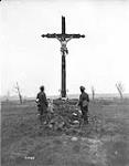 A crucifix in a graveyard near Lens. March, 1918 March, 1918.